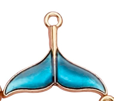 Whale tail teal with gold plated back