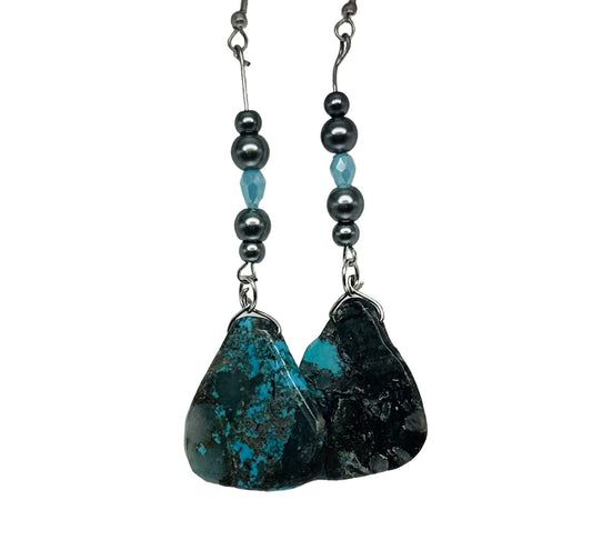 Turquoise rocks with light blue crystals